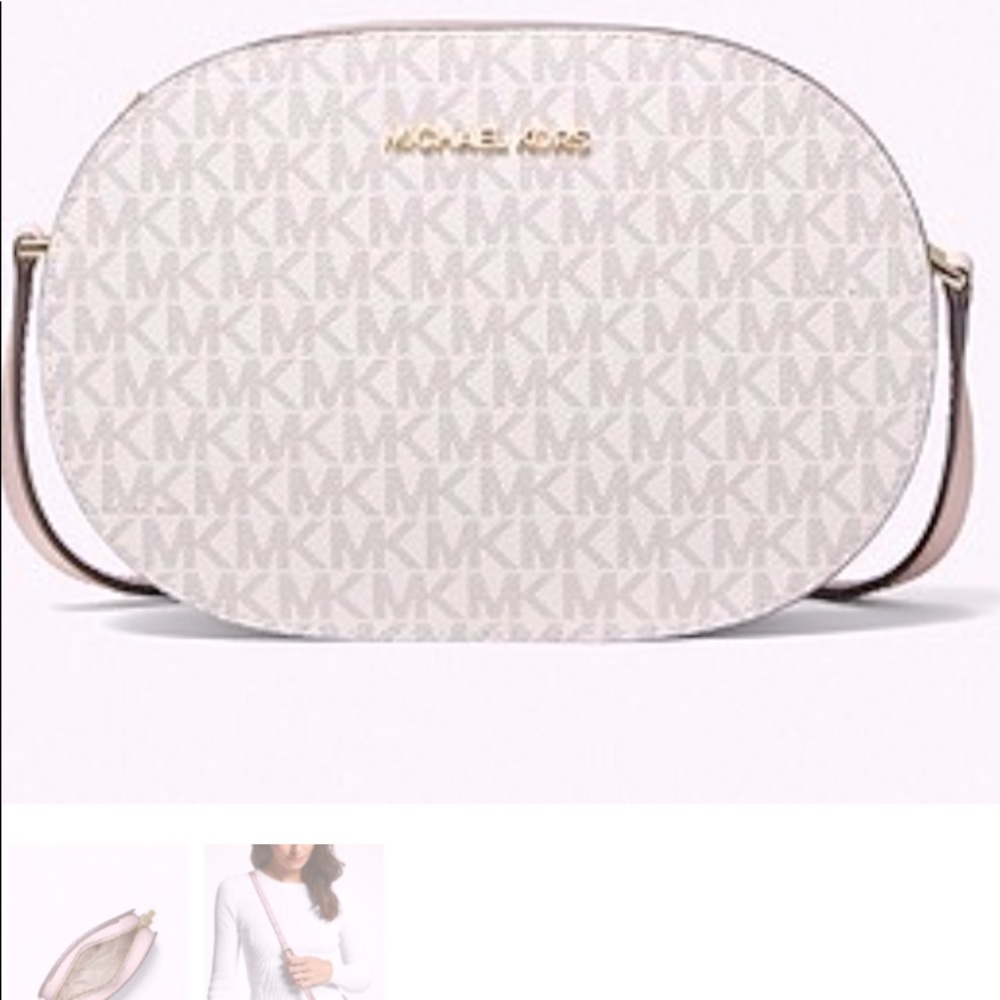 Eye catching Michael Kors medium logo cross body.